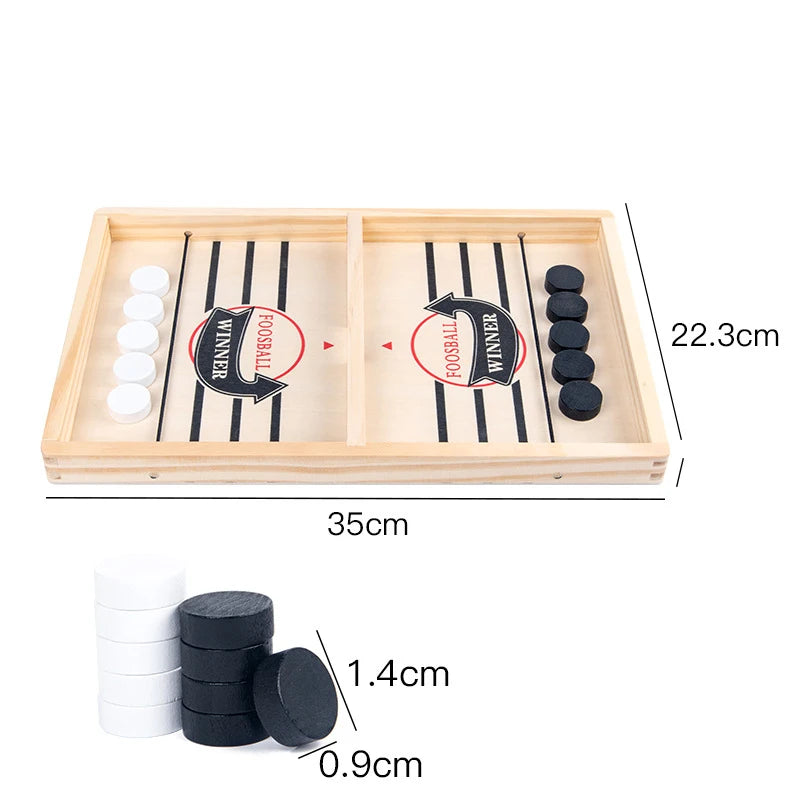 TABLE GAME WITH PUCKS AND ELASTIC